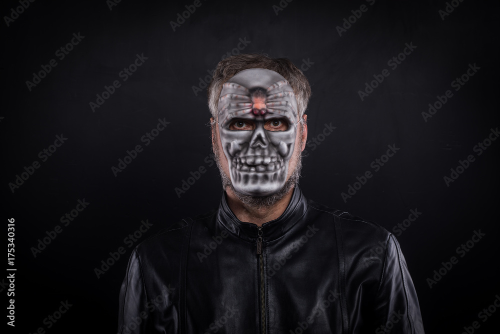 man in a terrible mask, the concept of halloween man in a terrible mask, the concept of halloween