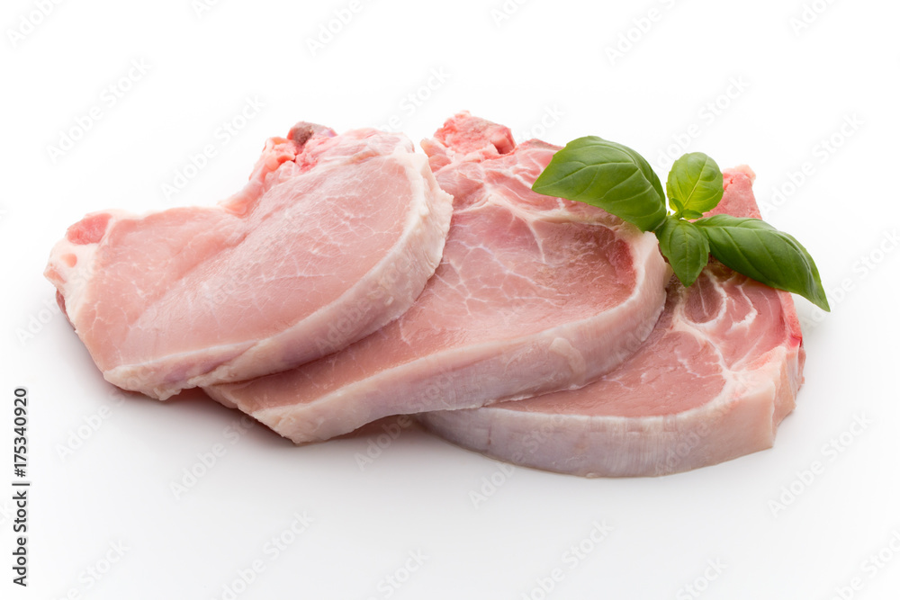 Fresh raw beef steak isolated on white background, top view.