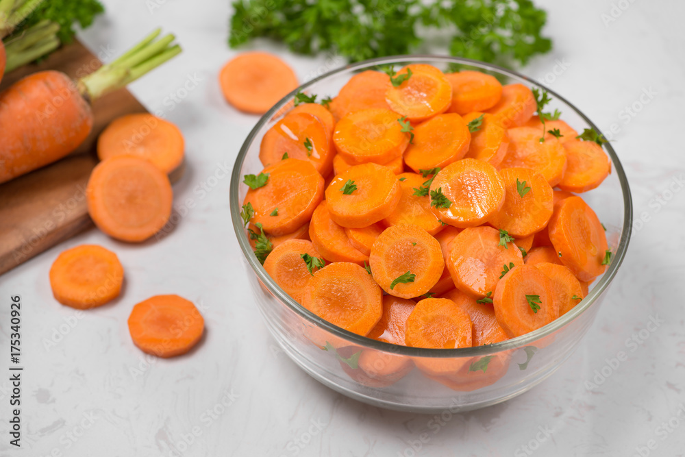 Chopped carrot slices. Fresh raw peeled carrot slice in bowl. Chopped carrot slices. Fresh raw peeled carrot slice in bowl.