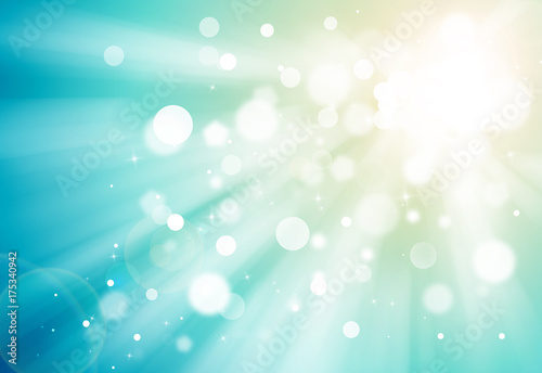 Blue and Gold glitter sparkles rays lights bokeh festive elegant abstract background.