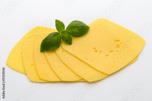 Cheese slices on the white background.