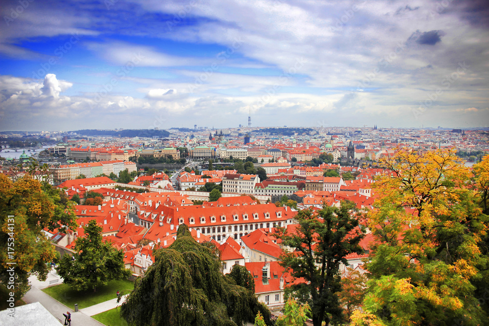 Top view to red tile roofs of Prague city Czech republic. Typical Prague houses. Wide angle panorama.