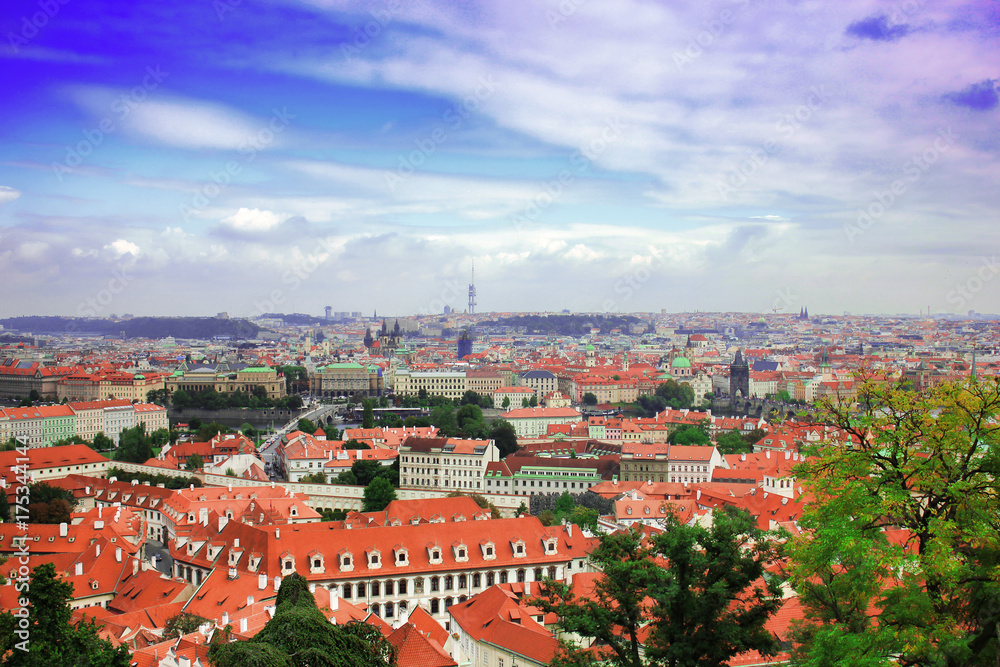 Top view to red tile roofs of Prague city Czech republic. Typical Prague houses. Wide angle panorama.