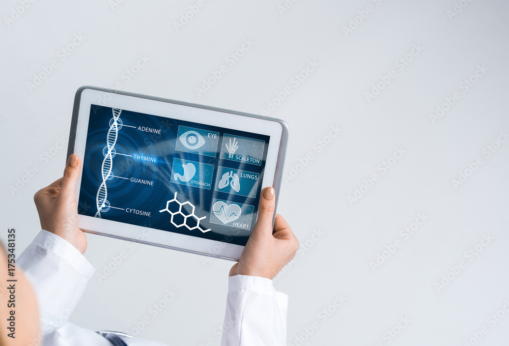 Close of female doctor hands working with tablet pc computer Close of female doctor hands working with tablet pc computer