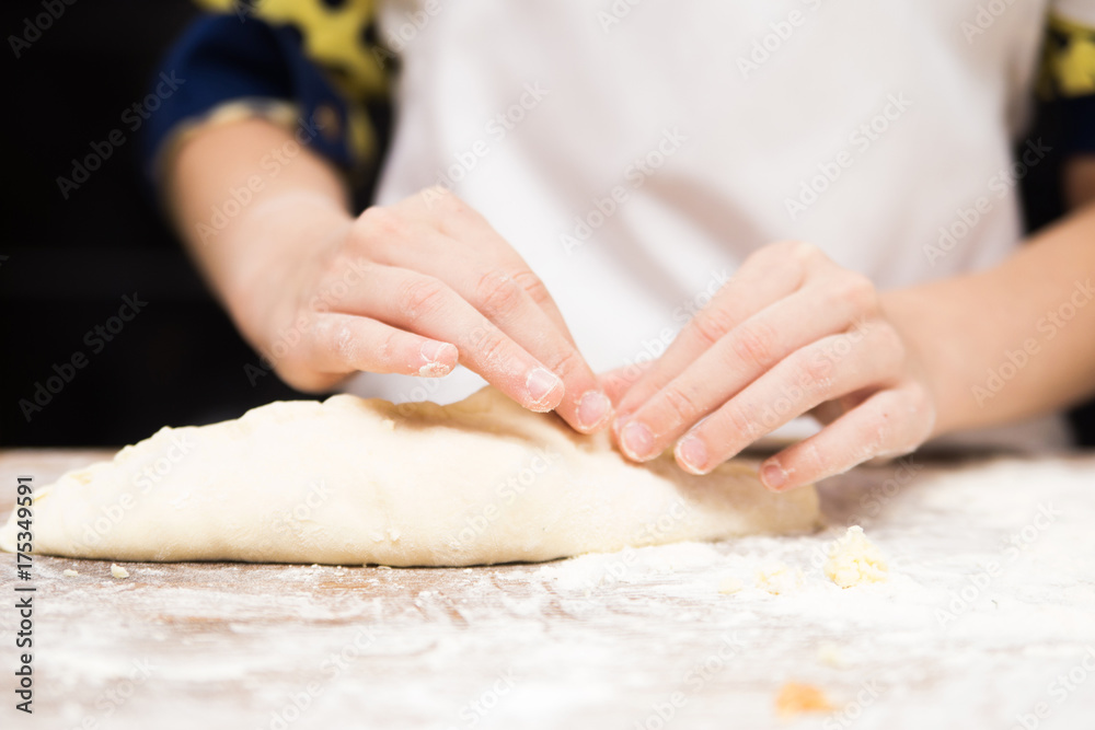 Production of flour products. Hands close up Production of flour products. Hands close up