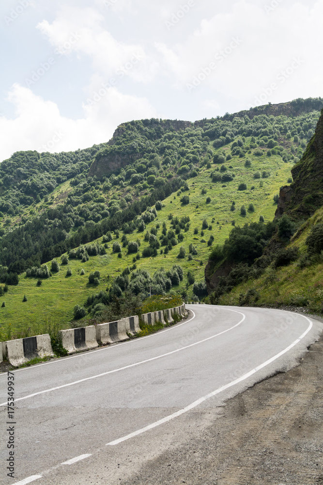 Mountain highway and green hills around  the way of the Georgian Military road