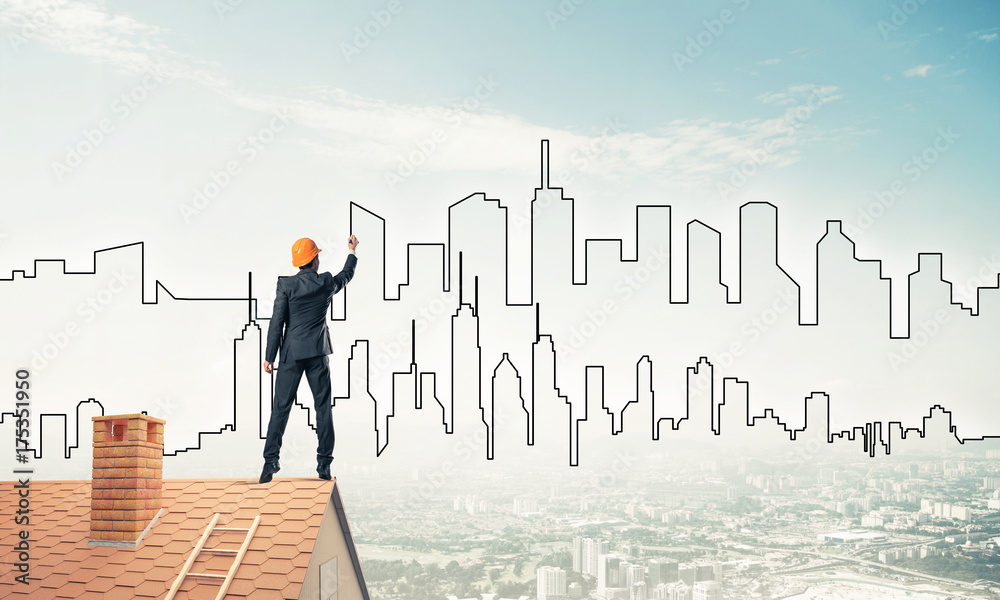 Man architect draw silhouette of modern city on blue sky. Mixed Man architect draw silhouette of modern city on blue sky. Mixed