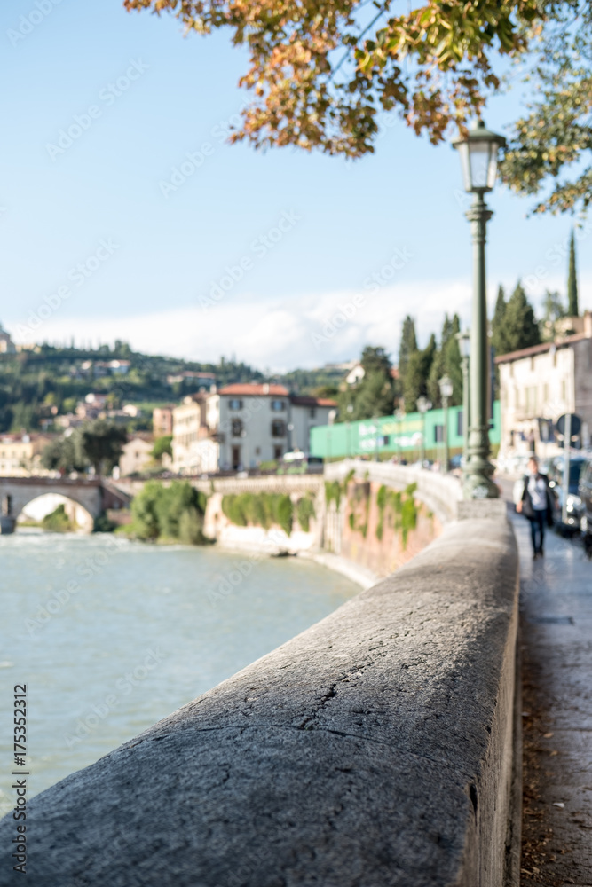Walkway along Adige River in Verona, Italy