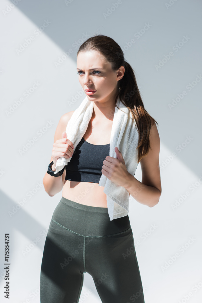 Fototapeta premium athletic woman with towel
