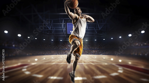 one basketball player jump in stadium panorama view © masisyan