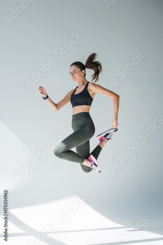 jumping girl in sportswear