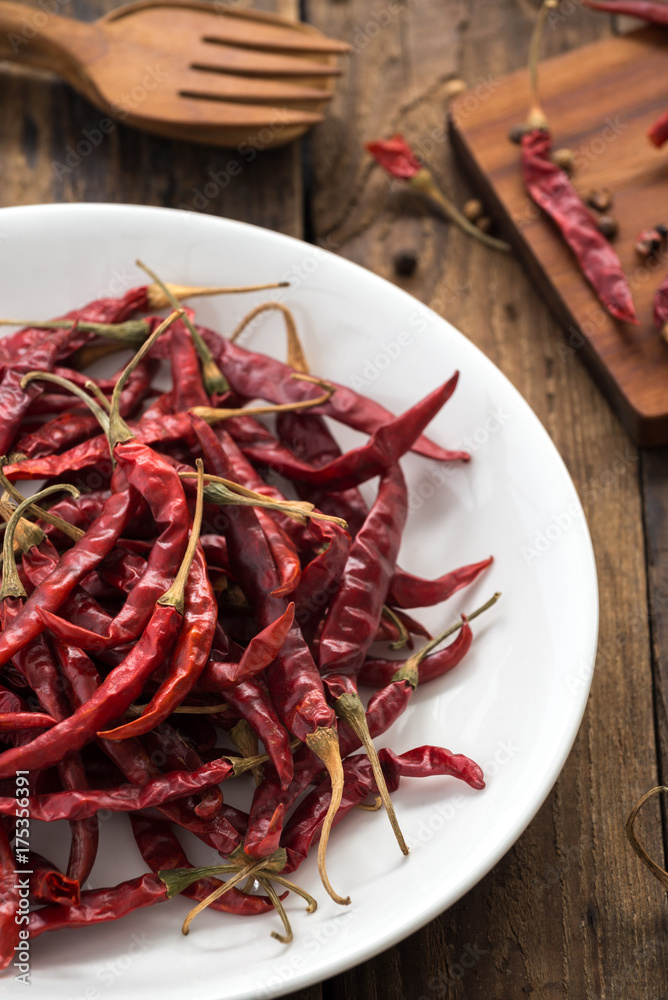 Red Dried Chillies or Dry chillies on wood
Red Dried Chillies or Dry chillies on wood