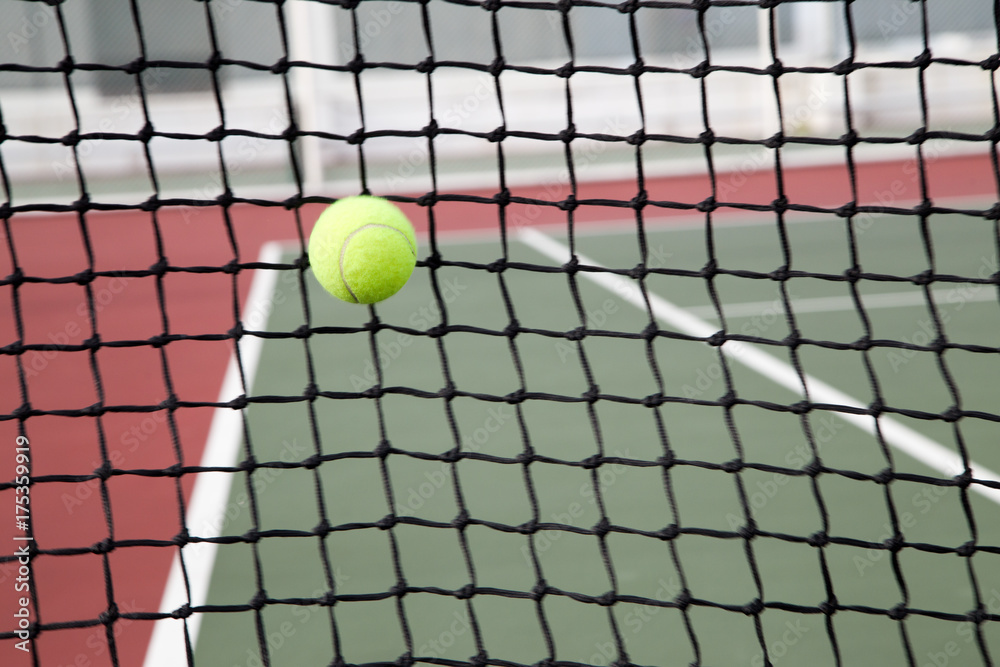 Tennis ball at net