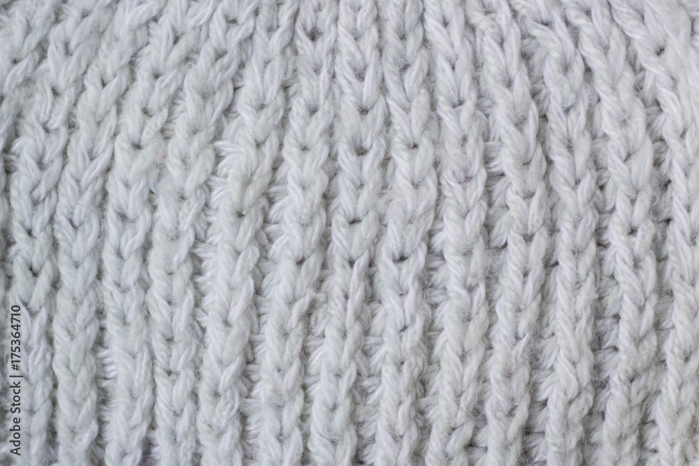 Sweater or scarf Pattern Of White Knitted Fabric Texture Background Sweater or scarf Pattern Of White Knitted Fabric Texture Background