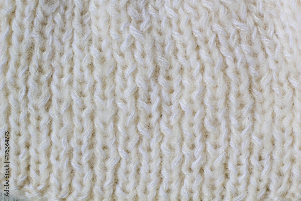 Sweater or scarf Pattern Of White Knitted Fabric Texture Background Sweater or scarf Pattern Of White Knitted Fabric Texture Background