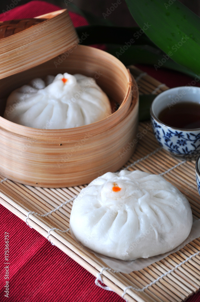 Chinese Bun with Tea on Background Chinese Bun with Tea on Background
