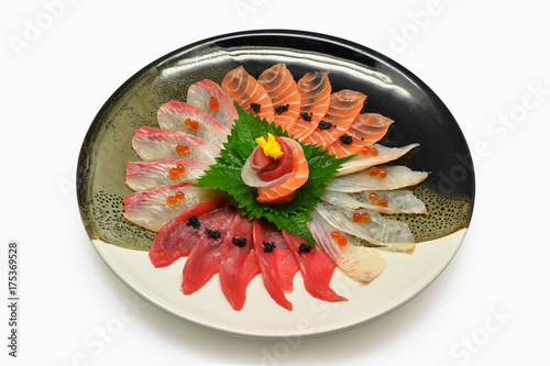 Japanese food raw fish mixed sashimi in plate Japanese style (maguro, otoro, salmon, sea bass, hamachi) on white background