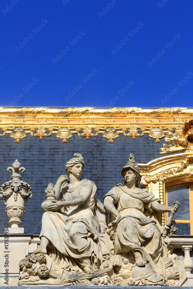 Sculptures on the roof of a building from the Cour de Marbre (Marble Courtyard) renovated in 2008. Palace of Versailles.