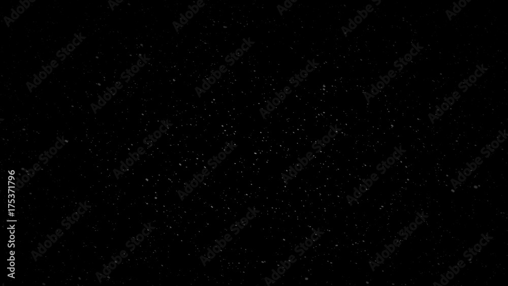 snow falling on a black background