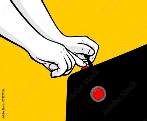Close up hands playing arcade machine