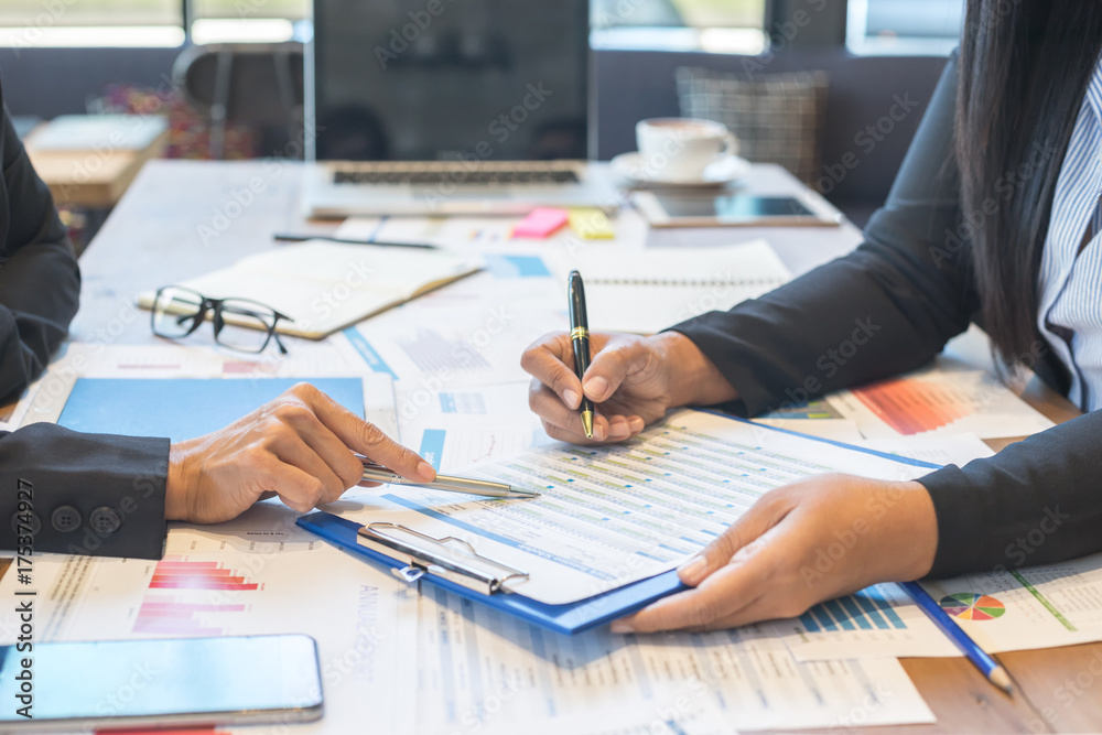 Business people are meeting for analysis data figures to plan business strategies. Business people are meeting for analysis data figures to plan business strategies.