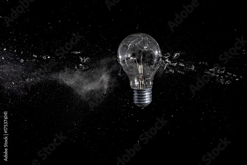  high speed photograph  electric bulb  concept of fragility and creativity.