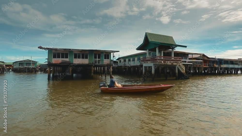 Bandar Seri Begawan,Brunei Darussalam-MARCH 31,2017: View on the village on water in the center of capital. Bandar Seri Begawan,Brunei Darussalam-MARCH 31,2017: View on the village on water in the center of capital.