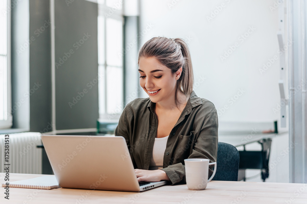 Student studying and learning online with a laptop in a desk at home. Student studying and learning online with a laptop in a desk at home.