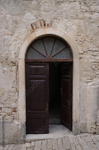 Old stone wall with open door, croatian, greek style © Jiri Dolezal