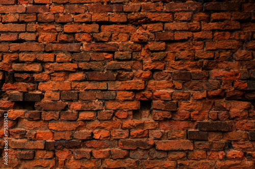 Red old brick wall, destroyed