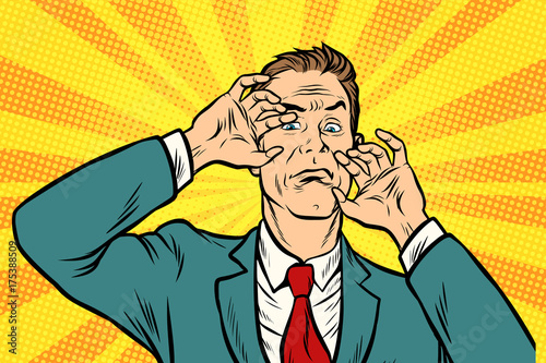 Scared man with a gesture protects your face