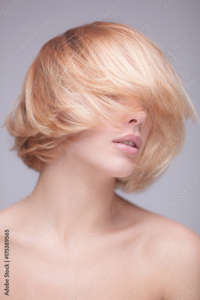 studio shot of beautiful young blond woman studio shot of beautiful young blond woman