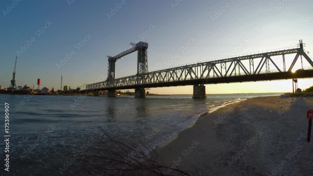 A moveable bridge across the mouth of the Dniester in Zatoka (Ukraine). Vertical-lift bridge. A moveable bridge across the mouth of the Dniester in Zatoka (Ukraine). Vertical-lift bridge.