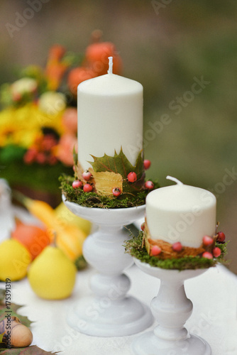 autumnal floristic decor on the street wedding table setting