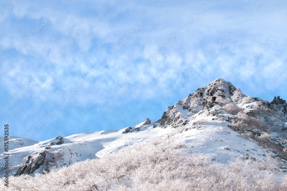 Snow mountain with blue sky.