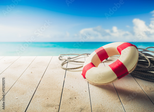 Photography life saver on a dock at the beach, summer vacations