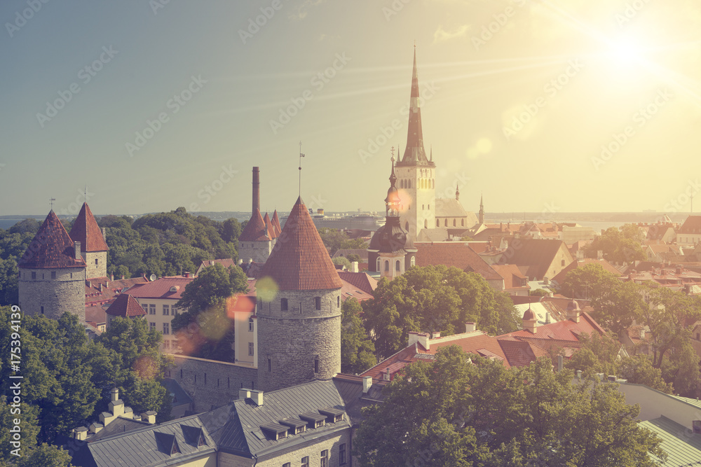 aerial view on observation deck of Old city's roofs and St. Nicholas' Church (Niguliste) . Tallinn. Estonia. toning