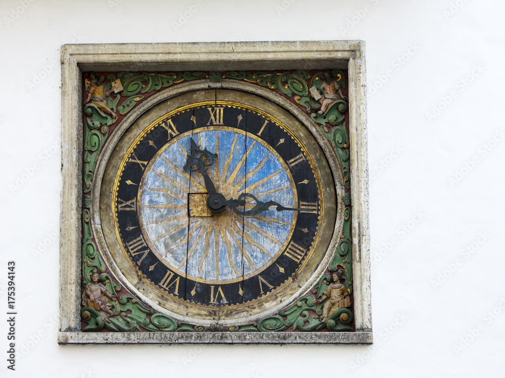 Old wall medieval clock of the Holy Spirit Church, Tallinn, Estonia..