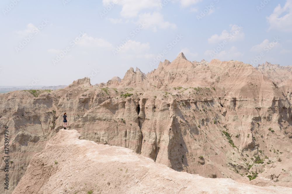 Standing on an overlook, Badlands National Park Standing on an overlook, Badlands National Park