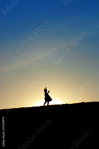 Little Girl Dancing On The Hill