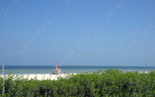 Lifeguard station on a deserted beach in Dubai, United Arab Emirates photo