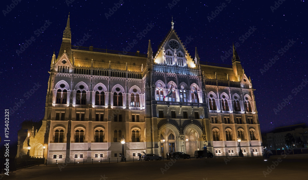 Budapest parliament at night side view / The iconic Budapest parliament in a starry night, side view from Kossuth Lajos tér