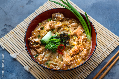 Oyakodon japanese chicken, egg on top of the rice bowl photo