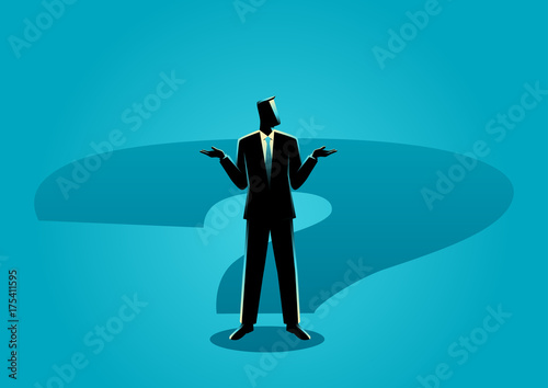 Businessman standing on question mark shadow