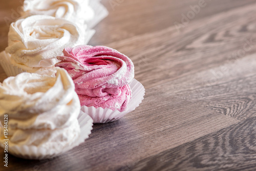 Wallpaper Mural pink and white homemade marshmallows on a gray wooden background. Torontodigital.ca