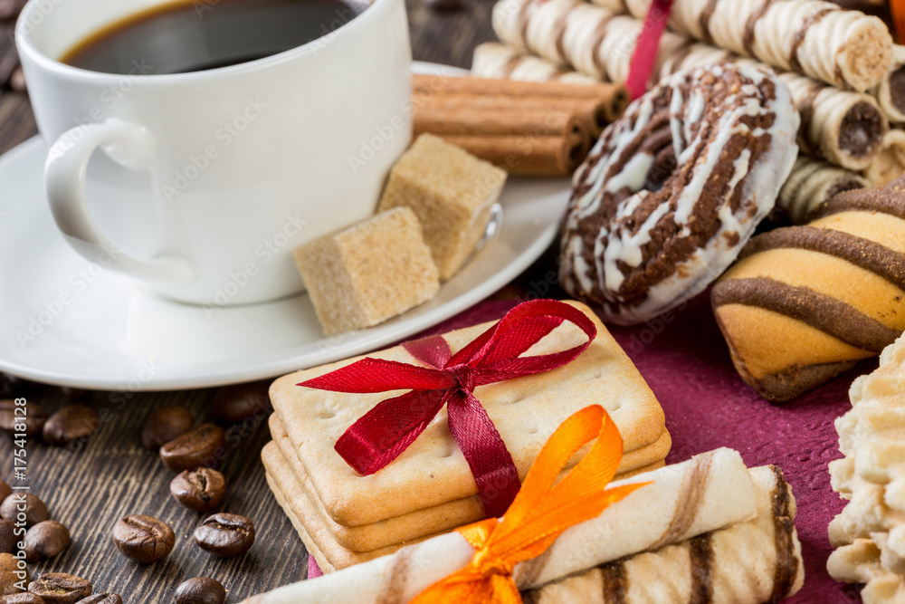 Biscuits and coffee on table Biscuits and coffee on table