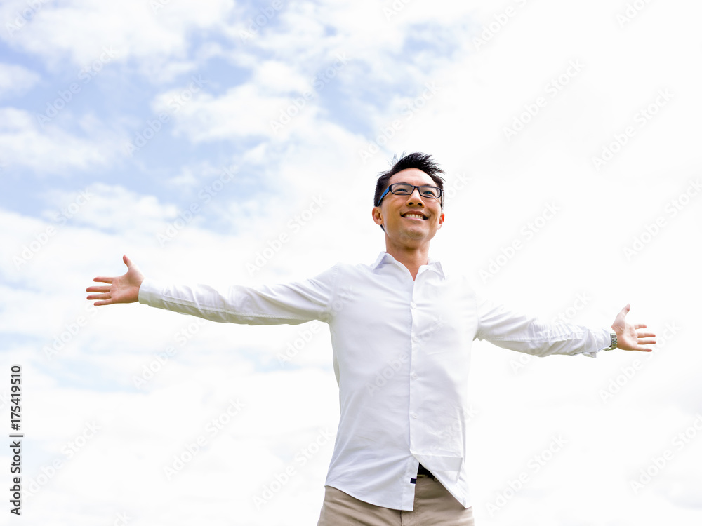 Young happy and successful businessman during his break in park Young happy and successful businessman during his break in park