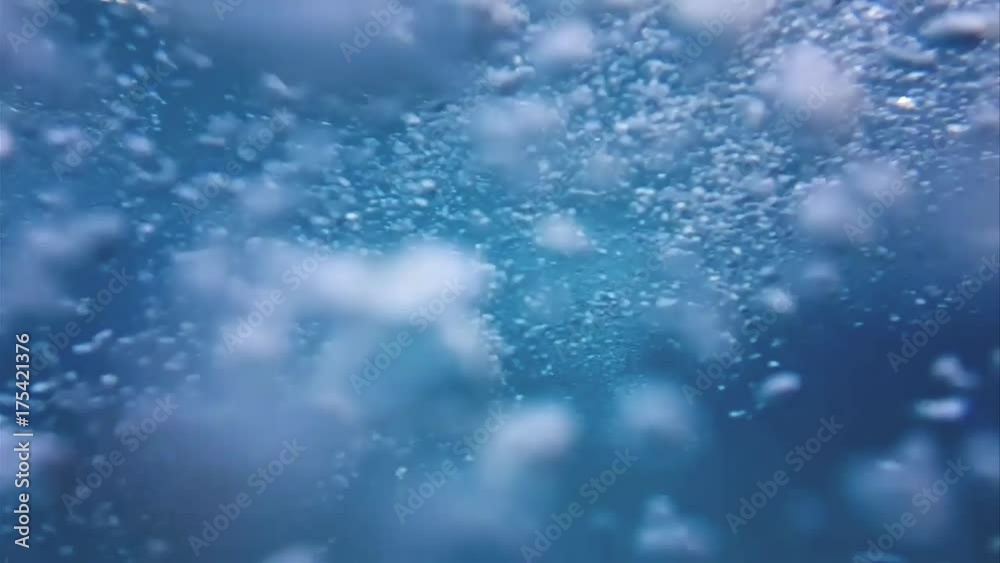 Bubbles underwater background in slow motion. Deep and blue water natural bubbles shot. Bubbles underwater background in slow motion. Deep and blue water natural bubbles shot.