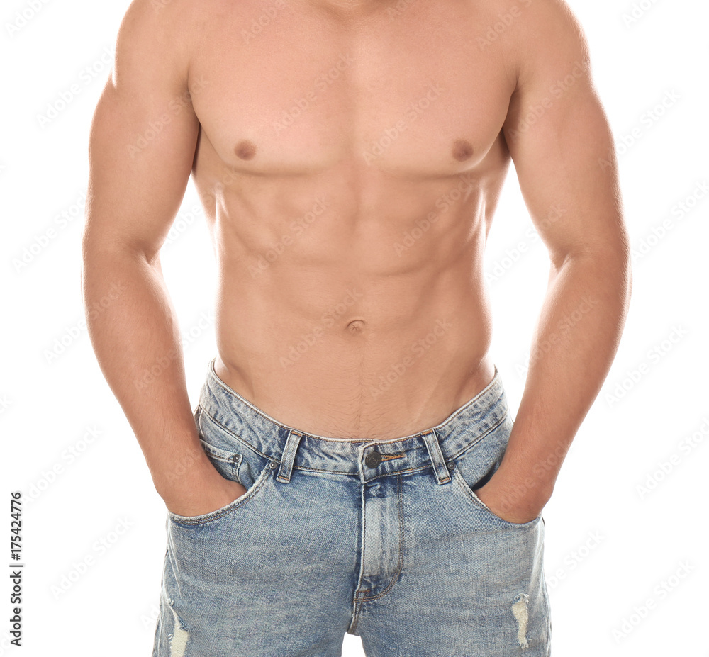 Naklejka premium Sporty young man on white background