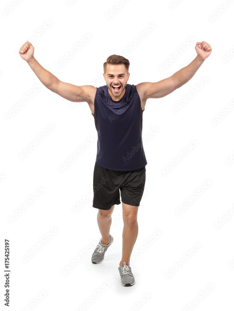 Young man in sportswear running against white background Young man in sportswear running against white background